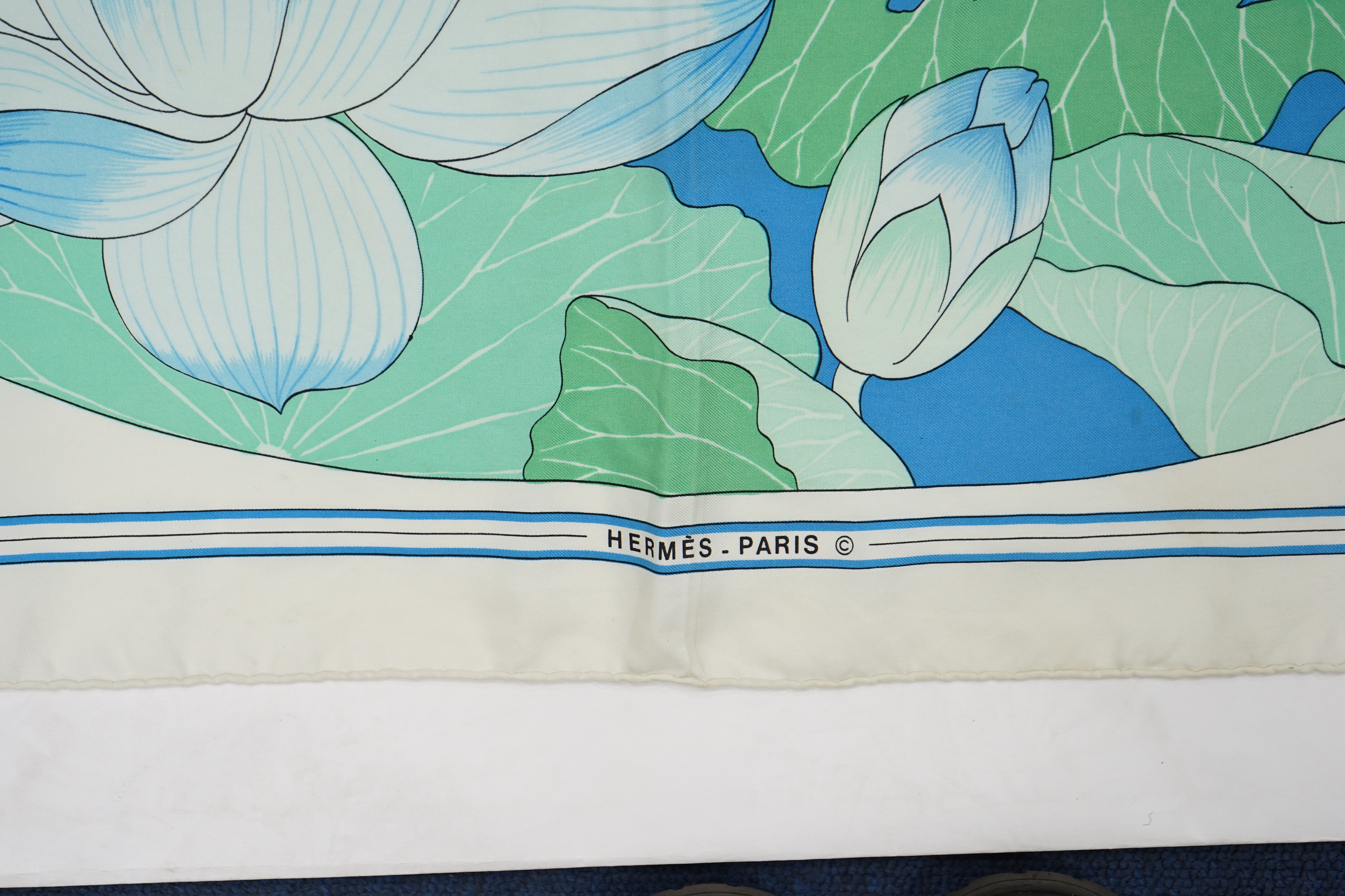 A Hermès Fleurs De Lotus designed by Christiane Vauzelles, 89cm x 89cm